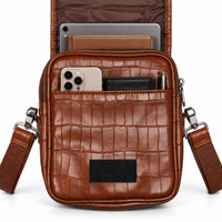 Brown sling bag interior compartments and lining
